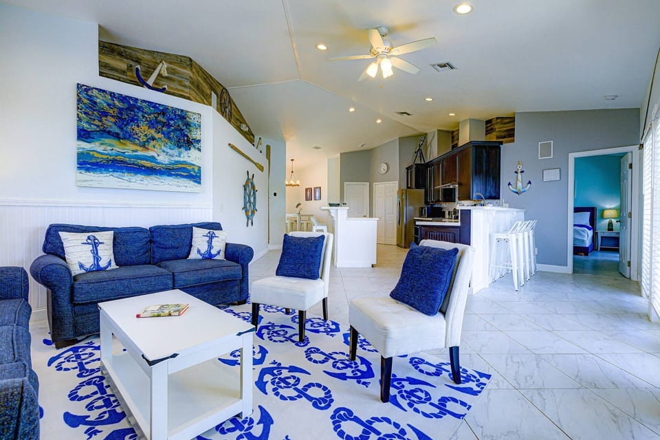 The open floor plan seamlessly connects the kitchen and living room, making it easy for everyone to gather and stay connected.