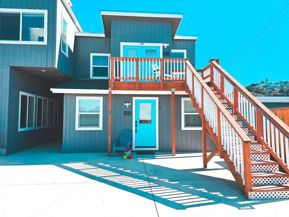 Exterior View of entry stairs and parking area