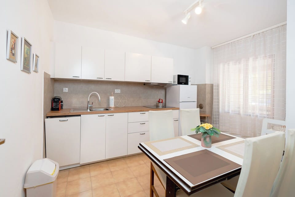 Apartment (A1) | Private kitchen | Espresso maker, fridge, microwave, stovetop