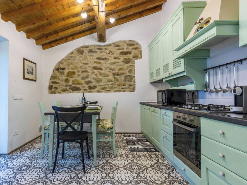 Interior Design, Kitchen, Furniture, Flooring, Countertop, Kitchen Appliance, Floor, Ceiling, Cabinetry, Major Appliance