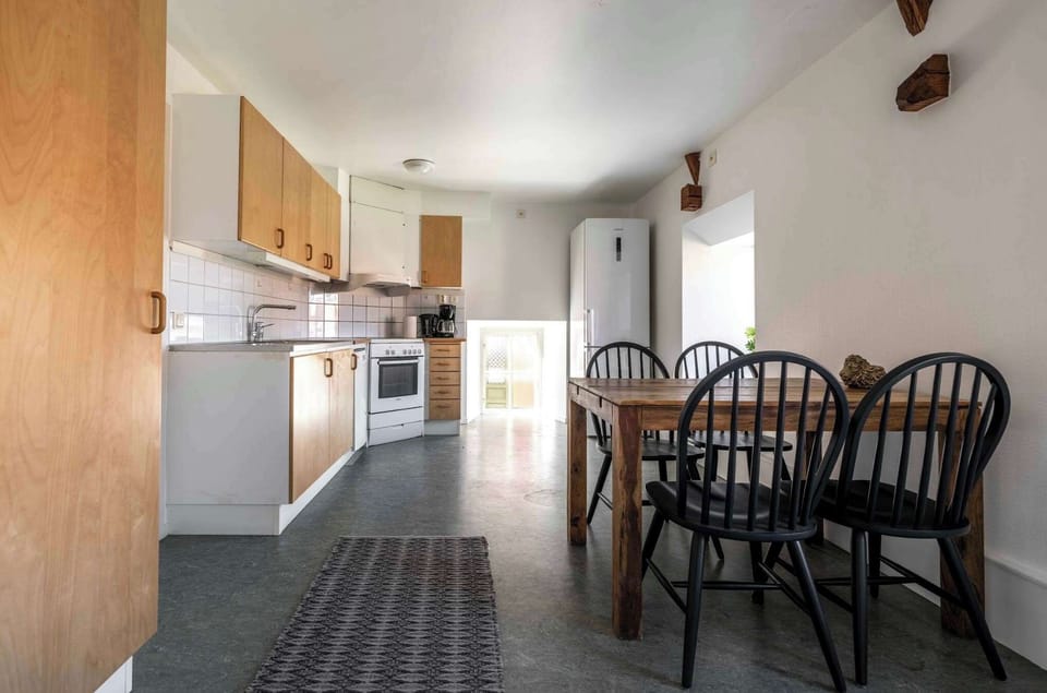 The fully equipped kitchen with all essentials you will need for a home cooked meal. There is a oven, stove, dishwasher, fridge, freezer, kettle, coffee maker, microwave and essentials.