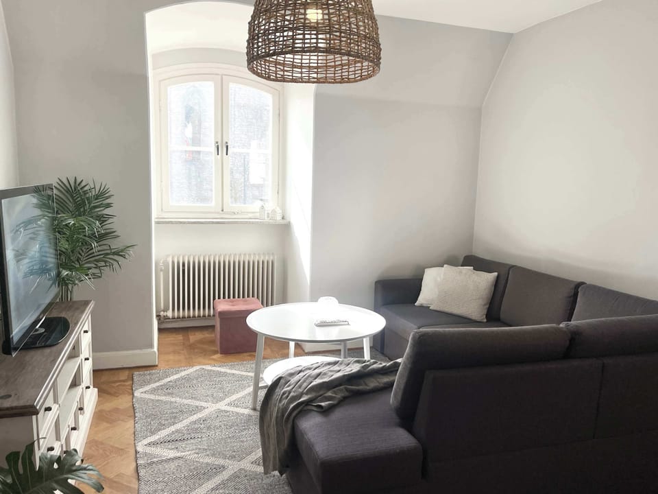 The sofa can be turned into a bed that is 140 cm wide and fits 2 guests.