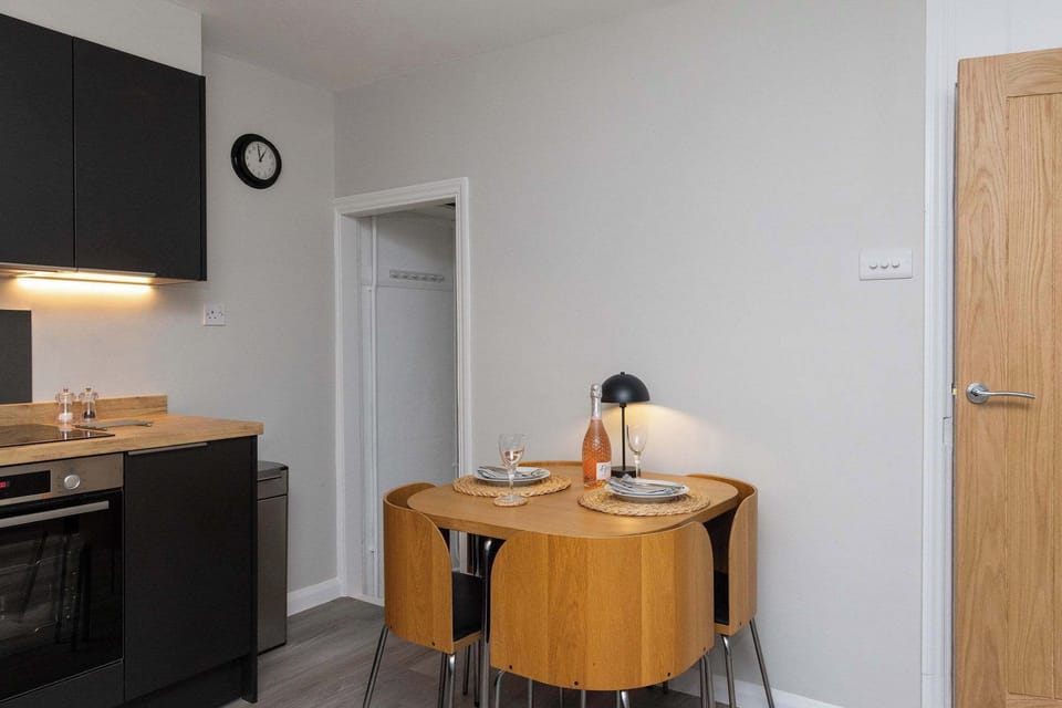 Sit down and enjoy your meals at this small table for 4 people.
