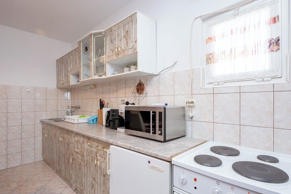 Apartment (A2) | Private kitchen | Espresso maker, fridge, microwave, oven