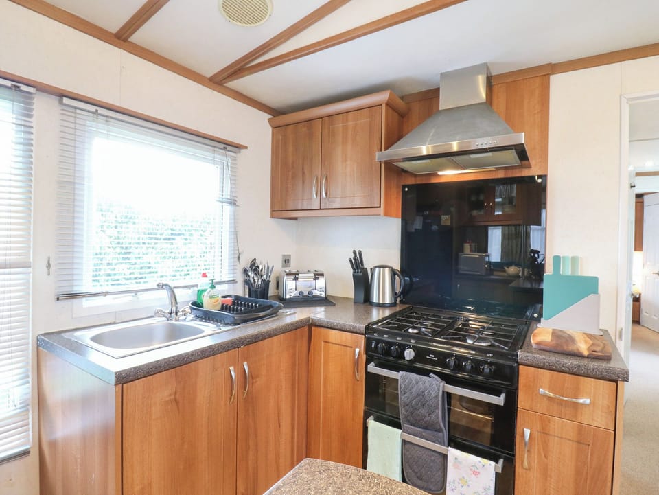 Fridge, microwave, toaster, cookware/dishes/utensils