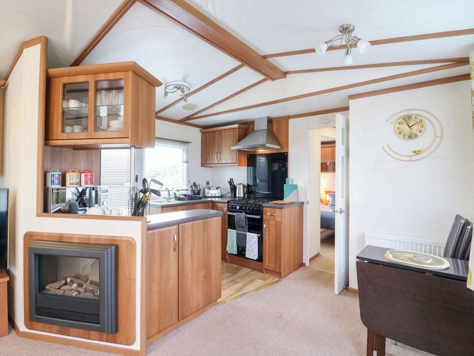 Fridge, microwave, toaster, cookware/dishes/utensils