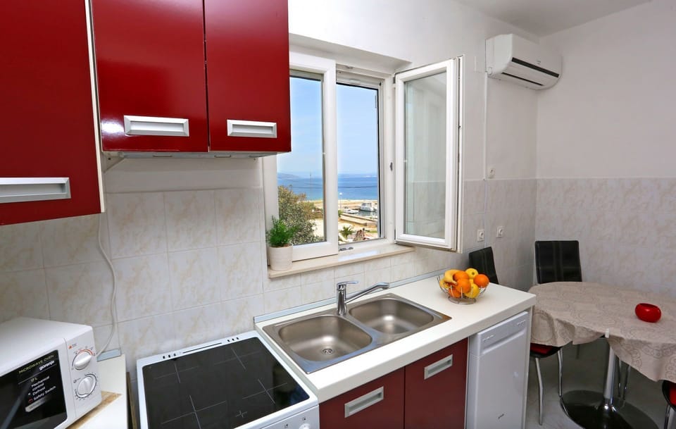 Apartment (A1) | Private kitchen | Espresso maker, fridge, microwave, oven