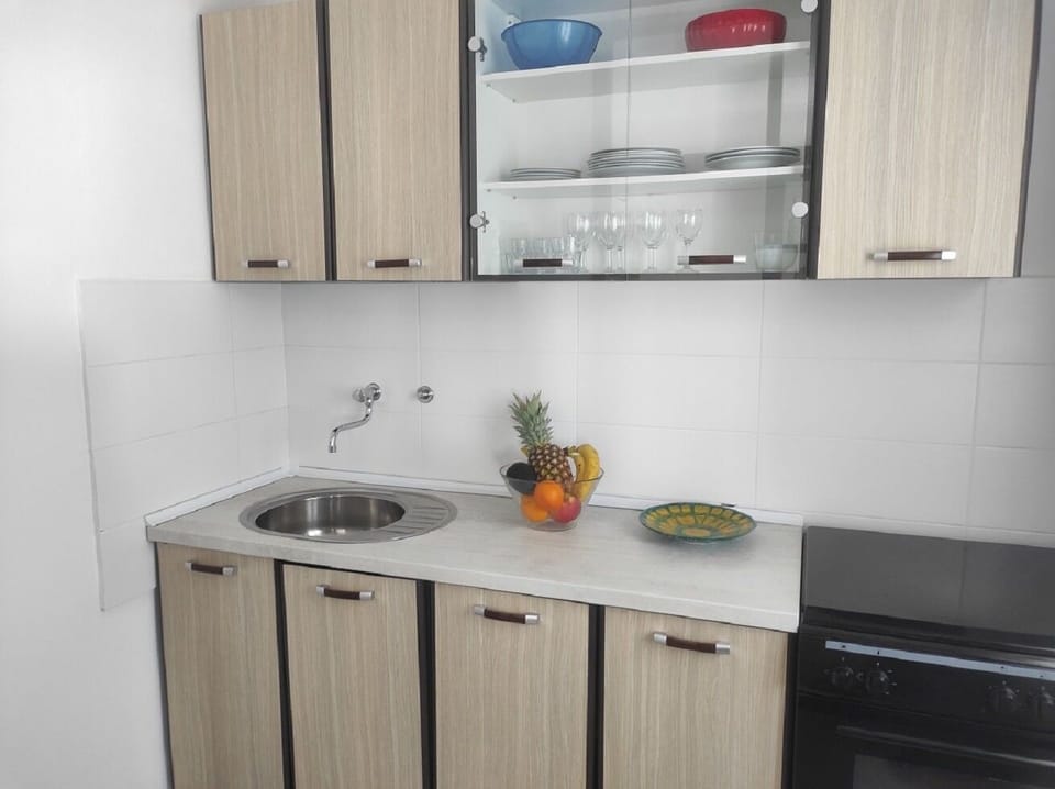 Apartment (A1) | Private kitchen | Fridge, microwave, oven, stovetop