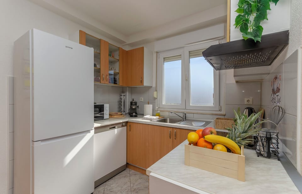 Apartment (A1) | Private kitchen | Fridge, microwave, oven, stovetop
