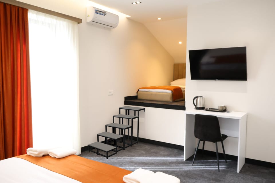 Family Room | Blackout drapes, soundproofing, iron/ironing board, free WiFi