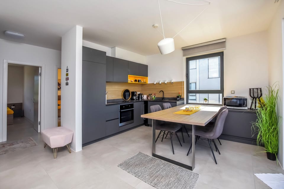 Apartment (A1) | Private kitchen | Fridge, microwave, oven, stovetop