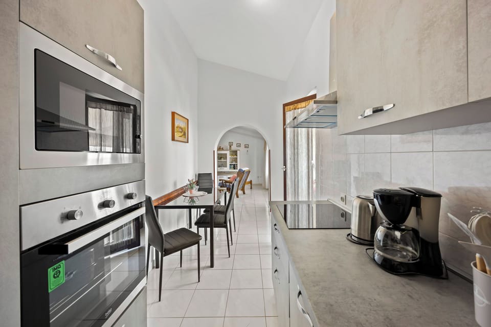 Apartment (A1) | Private kitchen | Fridge, microwave, oven, stovetop
