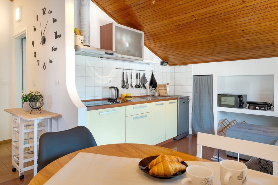 Apartment (A1) | Private kitchen | Espresso maker, fridge, microwave, stovetop
