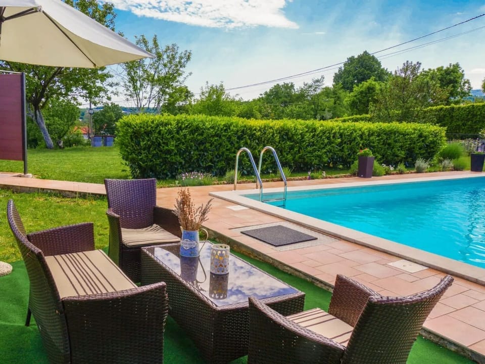 Outdoor pool, pool umbrellas, sun loungers