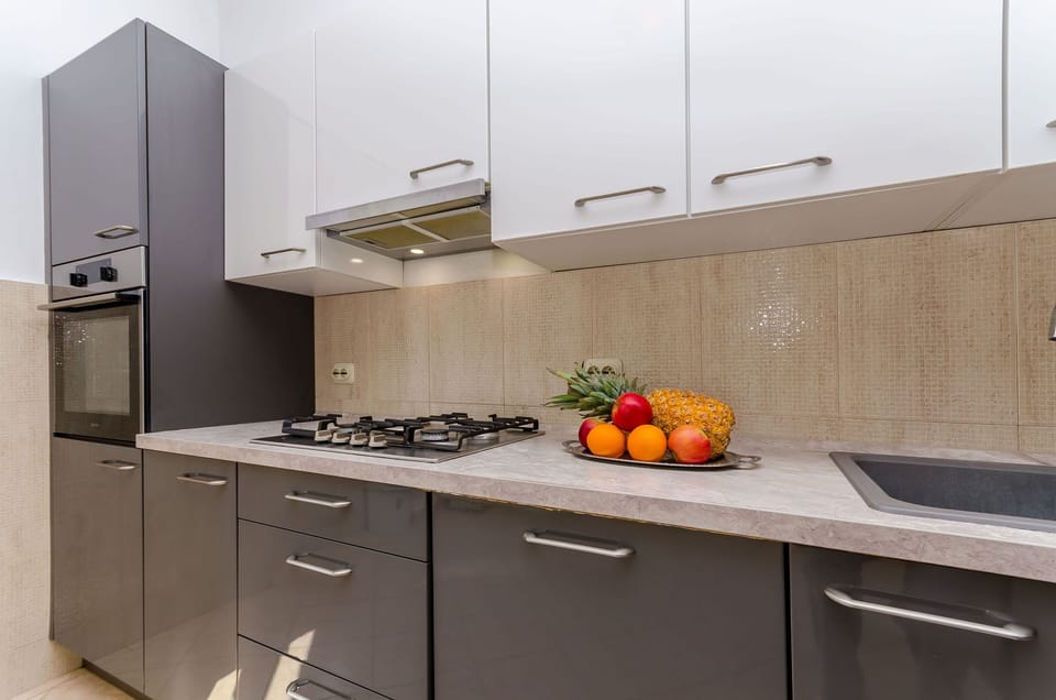 Apartment (A1) | Private kitchen | Espresso maker, fridge, oven, stovetop