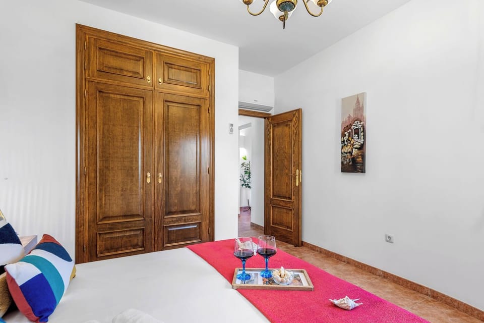 We are pleased to present our charming villa with a private pool, located in Calpe, on the beautiful Costa Blanca. Accommodating up to 6 people, the villa has three bedrooms and three bathrooms. It also features air conditioning in the living-dining room and all bedrooms, as well as free Wi-Fi for your comfort.Inside, you'll find a spacious living-dining room with satellite TV and direct access to a covered terrace. The separate kitchen is fully equipped with a gas stove. Each bedroom has a double bed and a separate bathroom with a bathtub. Accessed via an interior staircase, the upper floor features a separate bathroom with a bathtub. You'll also find two bedrooms: one with a double bed and an en-suite bathroom with a shower, and the other with two single beds. From this floor, you can enjoy a charming terrace with stunning views of Calpe and the Mediterranean Sea.Outside, the villa offers a beautiful garden with an 8x4 meter pool and Roman steps. It also has an outdoor shower, a toilet, and a portable barbecue for enjoying your meals al fresco. The garage has space for one car, and the villa has additional parking for two vehicles on the same plot, which is completely fenced.The villa is located in the quiet Ortembach residential area, ideal for those seeking a relaxing and stress-free holiday. Despite its serene location, it is just 500 meters from the nearest supermarket, 2.8 km from the beach and restaurants, and 2.5 km from the center of Calpe.We hope you enjoy your stay in our cozy villa with private pool and sea views in Calpe. If you have any questions or need more information, please do not hesitate to contact us.We look forward to welcoming you soon!