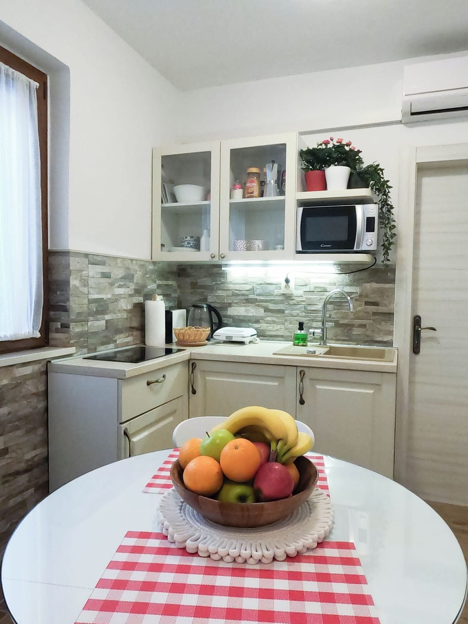 Mini-fridge, microwave, stovetop, electric kettle