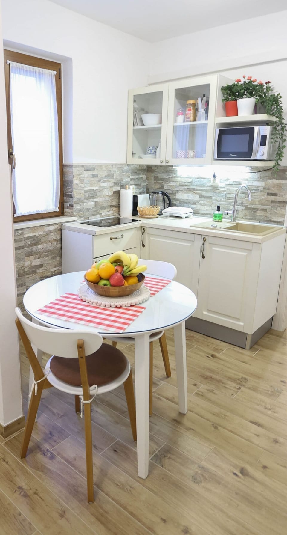 Apartment (A1) | Private kitchen | Mini-fridge, microwave, stovetop, electric kettle