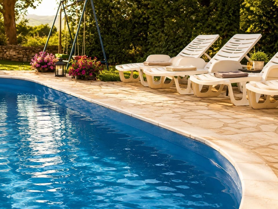 Outdoor pool, pool umbrellas, sun loungers