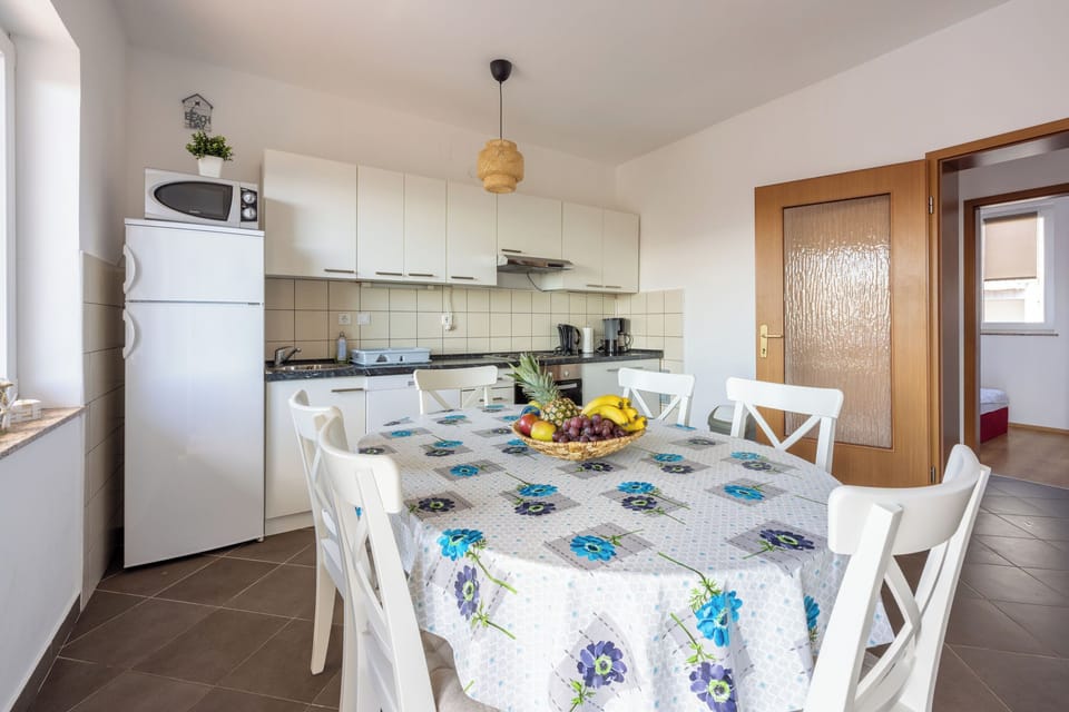 Apartment (A2) | Private kitchen | Fridge, microwave, oven, stovetop