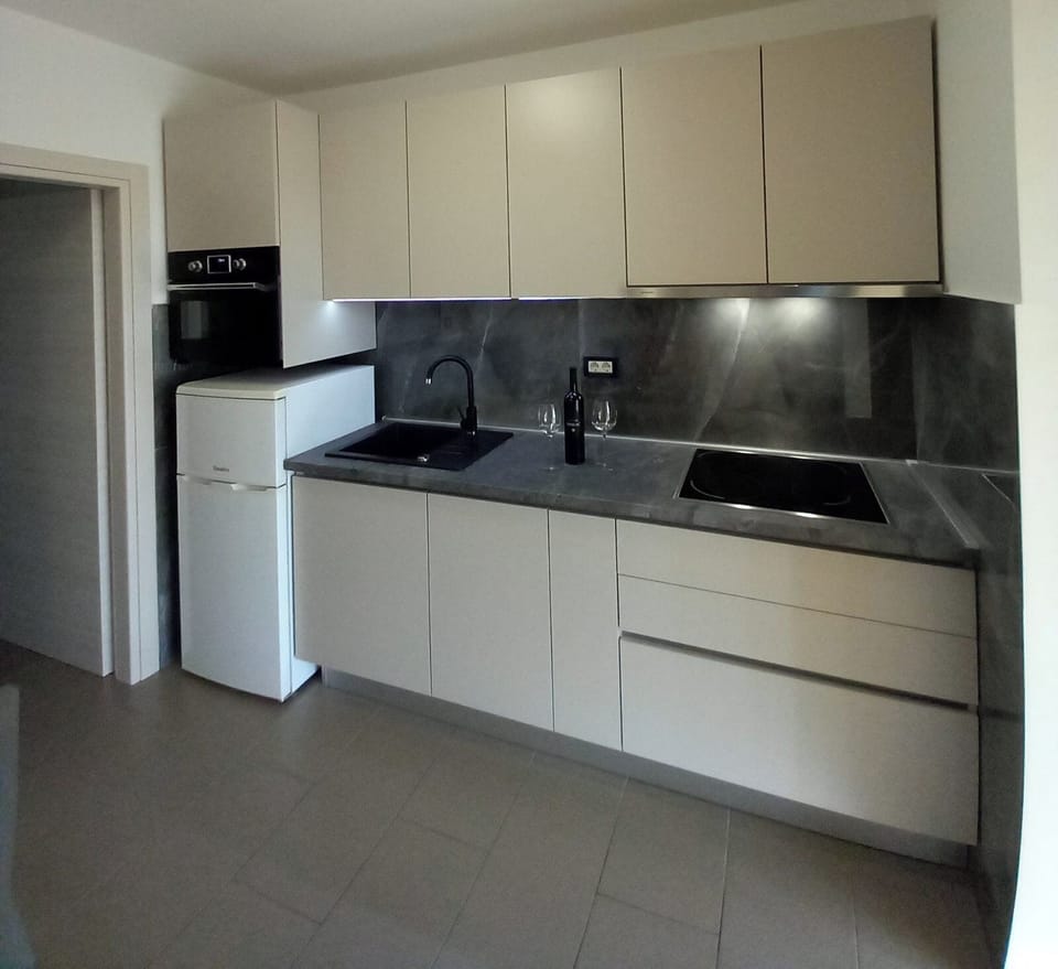Apartment (A1) | Private kitchen | Espresso maker, fridge, microwave, oven