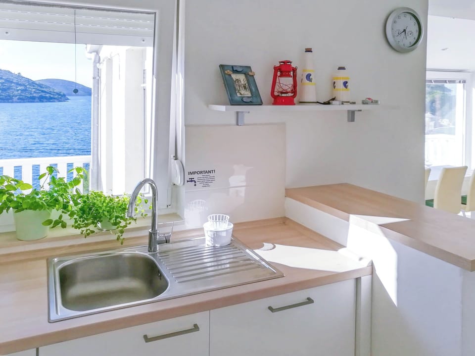 Apartment (A1) | Private kitchen | Fridge, microwave, oven, stovetop