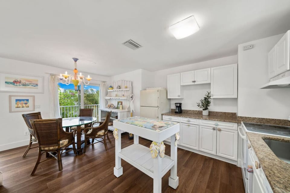 Bright kitchen with plenty of counter space and all essentials provided