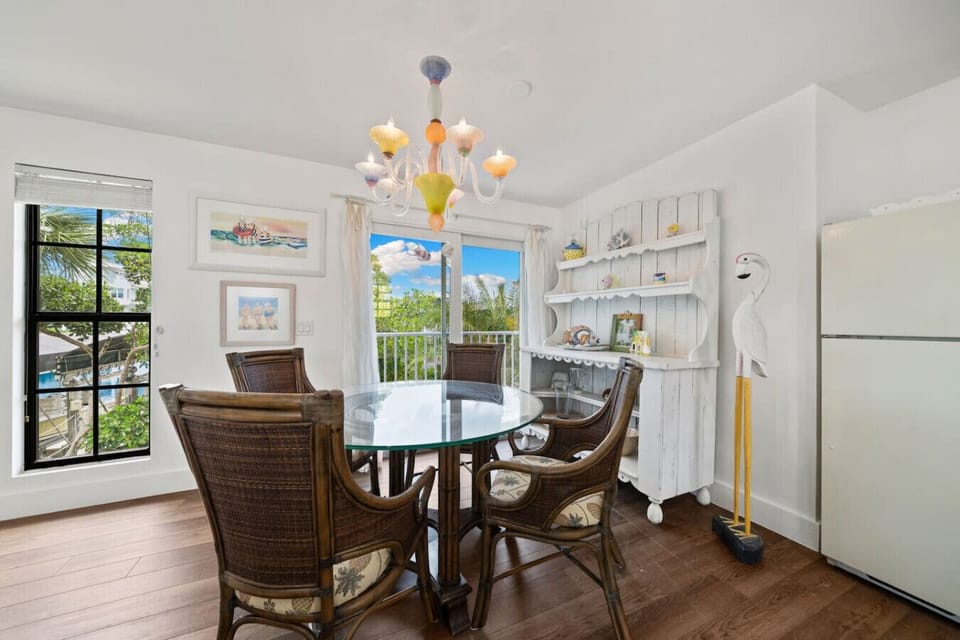 Dining nook with chandelier and bay views for shared meals
