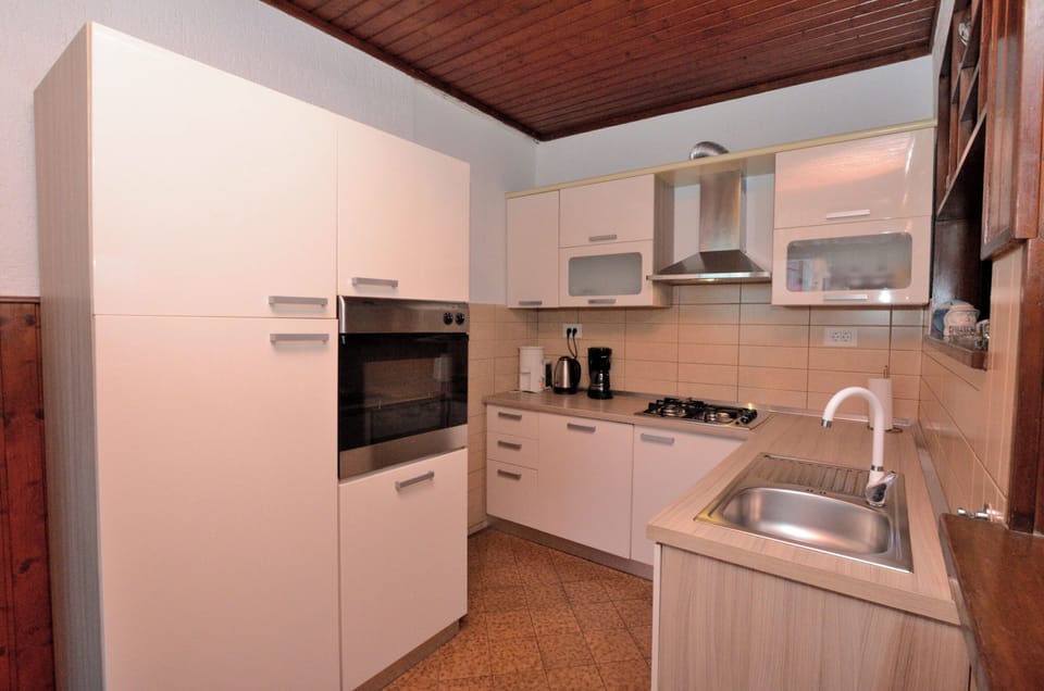 Villa | Private kitchen | Espresso maker, fridge, microwave, oven