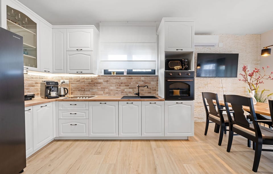 Villa | Private kitchen | Fridge, microwave, oven, stovetop