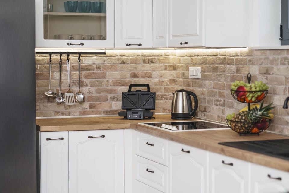 Villa | Private kitchen | Fridge, microwave, oven, stovetop