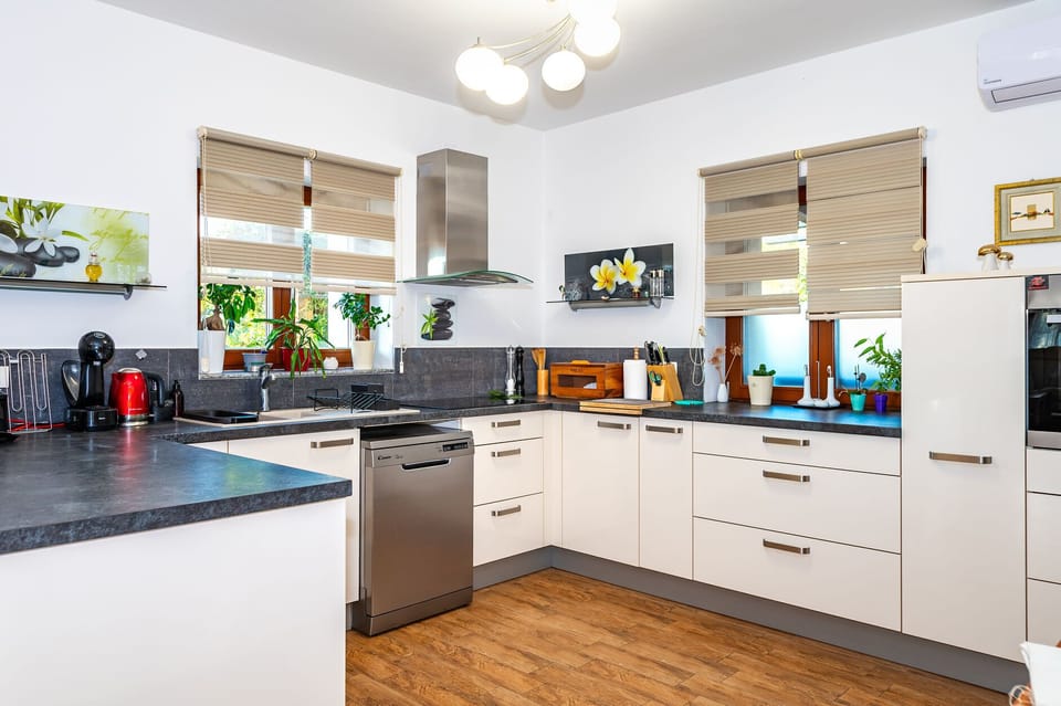 Villa | Private kitchen | Fridge, microwave, oven, stovetop