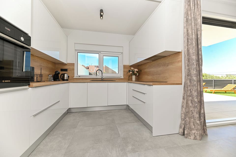 Villa | Private kitchen | Espresso maker, fridge, microwave, oven