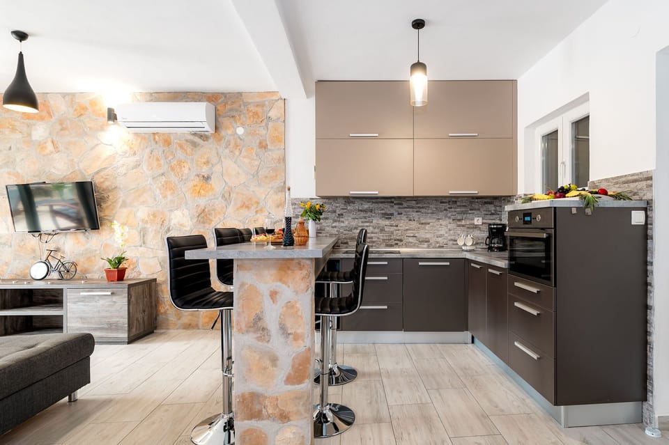 Villa | Private kitchen | Fridge, microwave, oven, stovetop