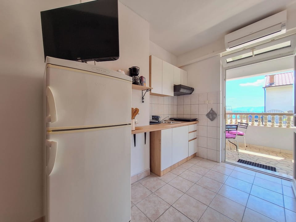 Apartment (A1) | Private kitchen | Espresso maker, fridge, stovetop, electric kettle