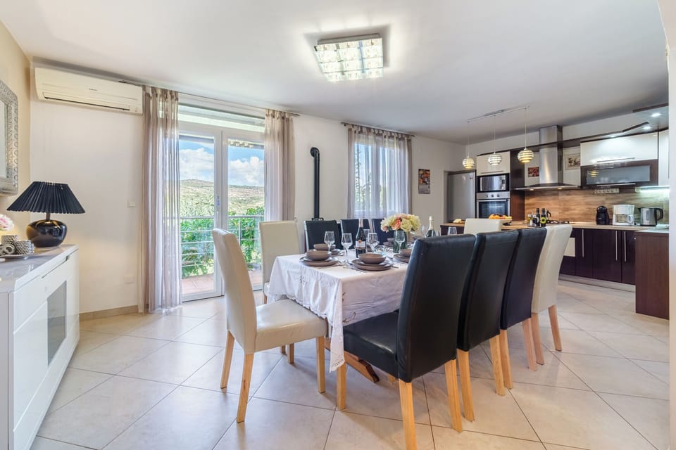 Villa | Private kitchen | Fridge, microwave, oven, stovetop