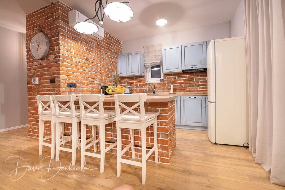 Villa | Private kitchen | Fridge, microwave, oven, stovetop
