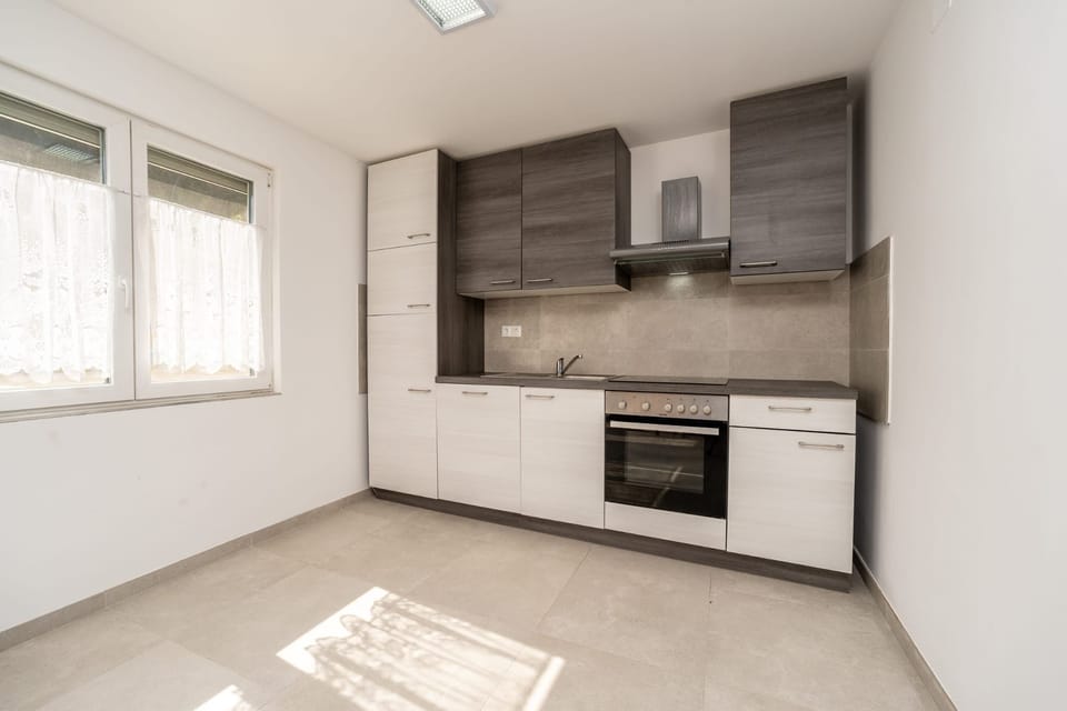 Villa | Private kitchen | Fridge, microwave, oven, stovetop