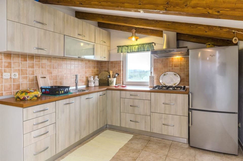 Villa | Private kitchen | Fridge, microwave, oven, stovetop