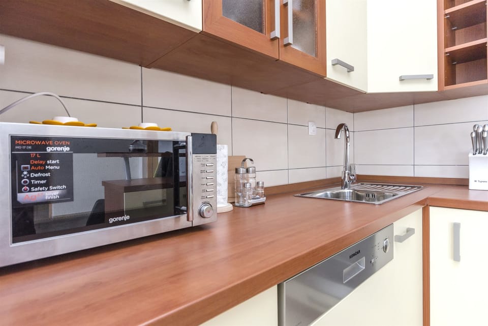 Villa | Private kitchen | Fridge, microwave, oven, stovetop
