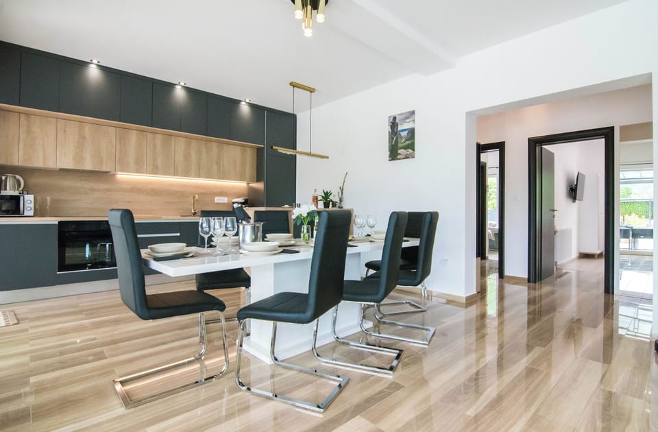 Villa | Private kitchen | Fridge, microwave, oven, stovetop
