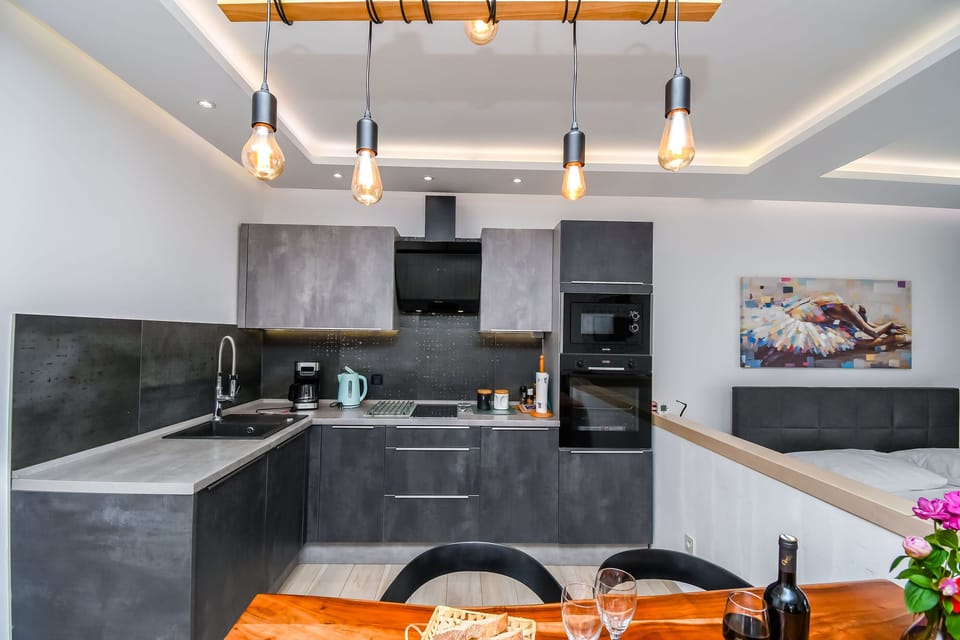 Villa | Private kitchen | Fridge, microwave, oven, stovetop