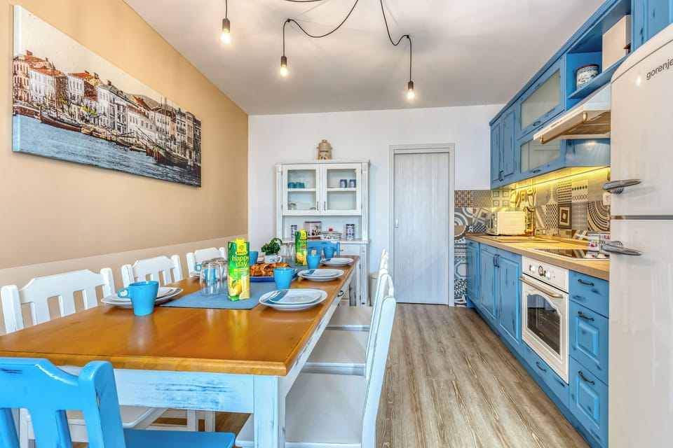 Villa | Private kitchen | Fridge, microwave, oven, stovetop