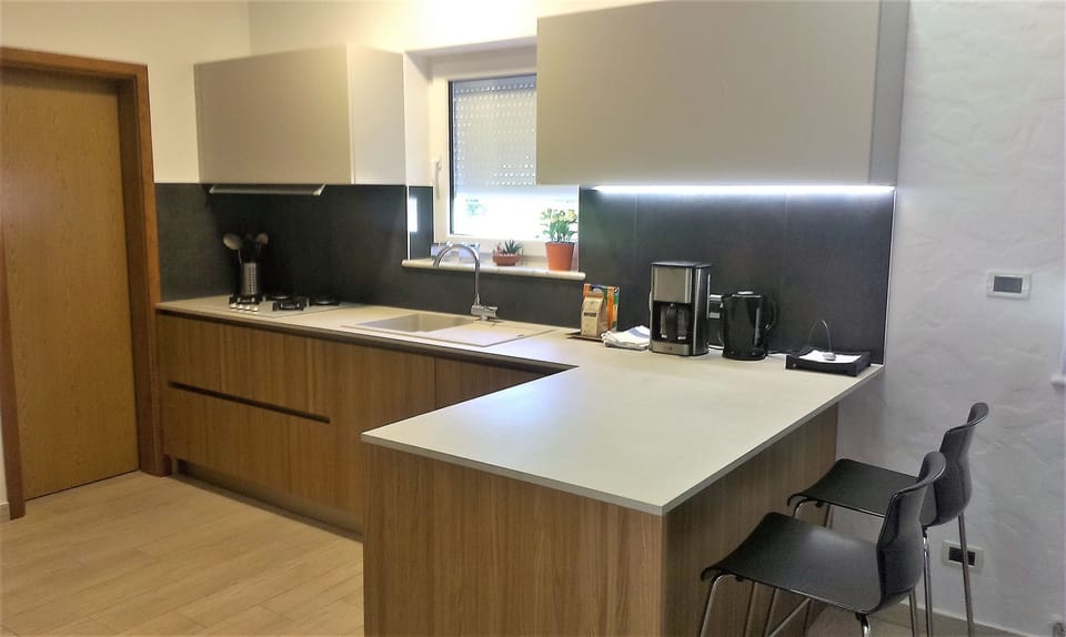 Villa | Private kitchen | Fridge, microwave, oven, stovetop