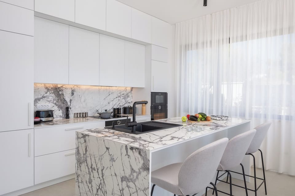Villa | Private kitchen | Fridge, microwave, oven, stovetop