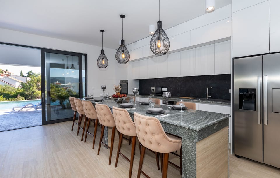 Villa | Private kitchen | Fridge, oven, stovetop, dishwasher