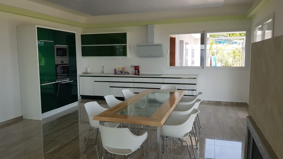 Villa | Private kitchen | Fridge, microwave, oven, stovetop