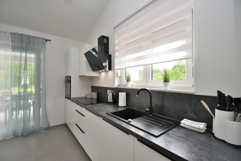 Villa | Private kitchen | Fridge, microwave, oven, stovetop