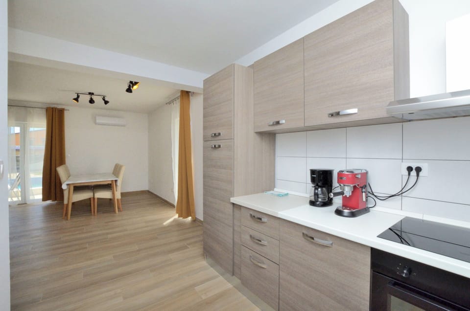 Villa | Private kitchen | Fridge, microwave, oven, stovetop
