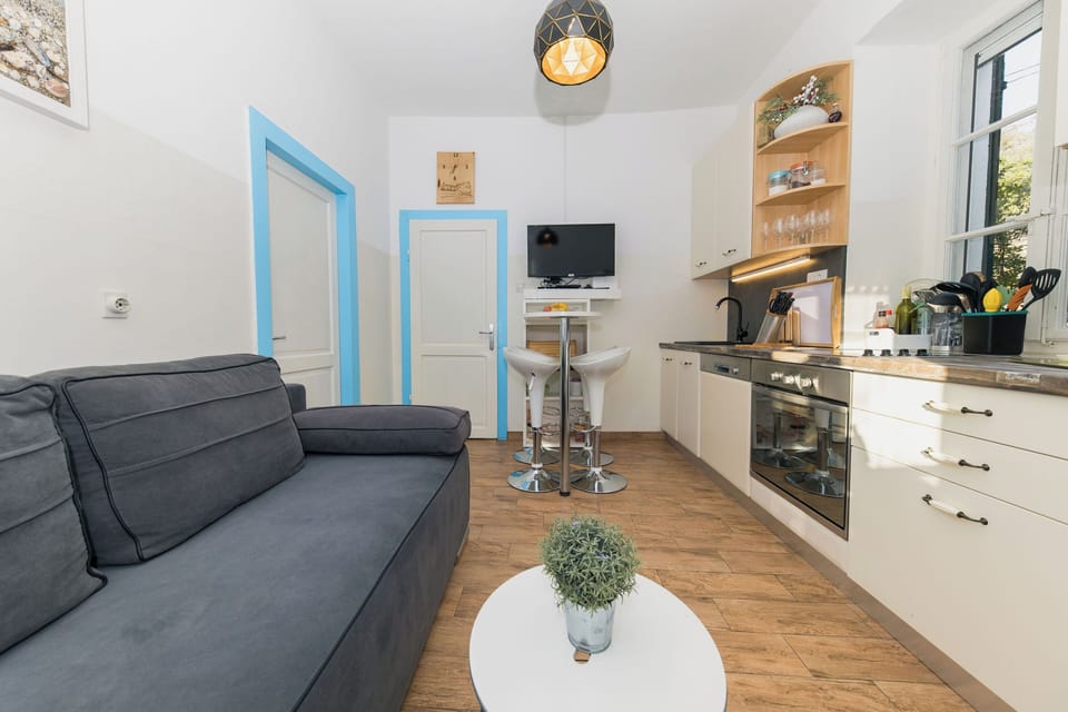 Villa | Private kitchen | Fridge, oven, stovetop, dishwasher